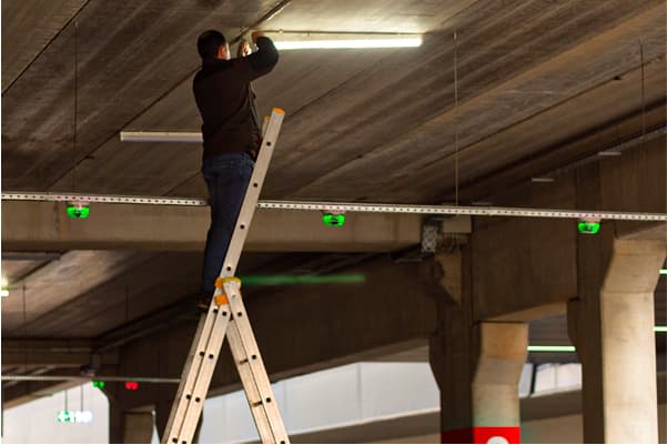 Folded ladders stored in a garage